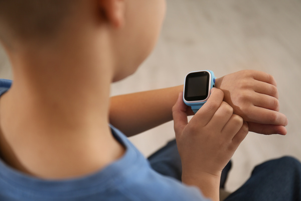 Adjusting a smartwatch.