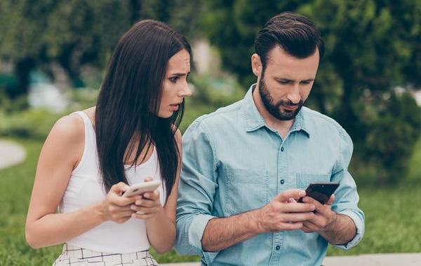 Parents looking at their phones.