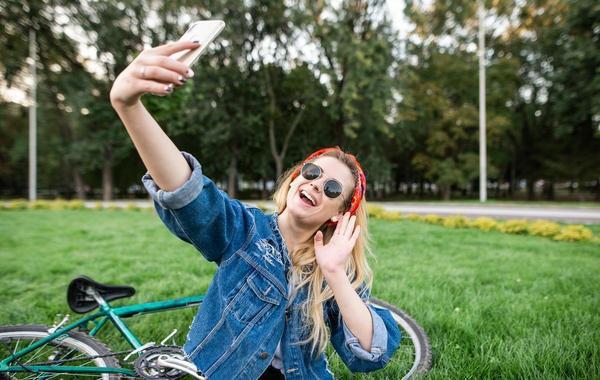 Teenager taking a selfie.