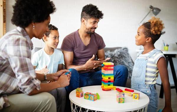 Family playing a game together.