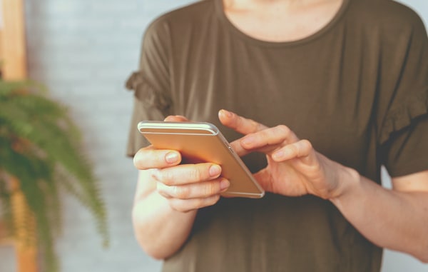 Person using their phone.