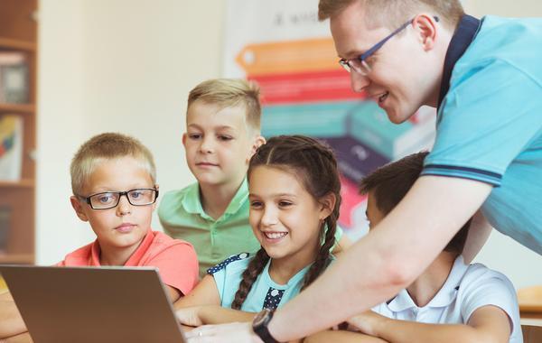 Teacher with four students.